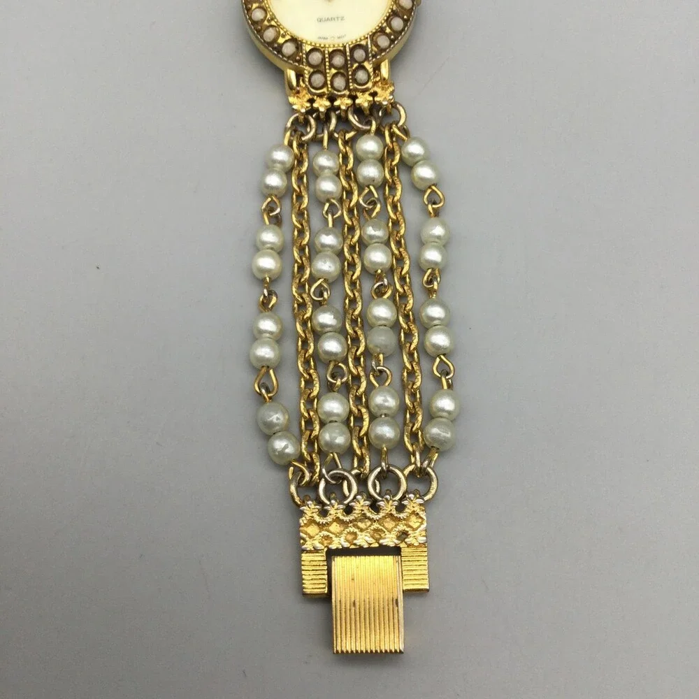 Futura Womens Watch 25mm MOP Dial Gold Tone Faux Pearl 3216 New Battery 6.75